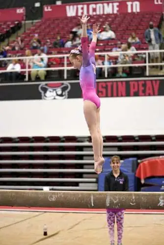 Elizabeth on beam